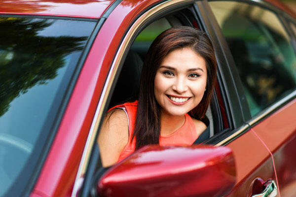 Girl Smiling in Car